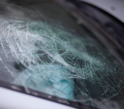 Broken car windshield after an accident